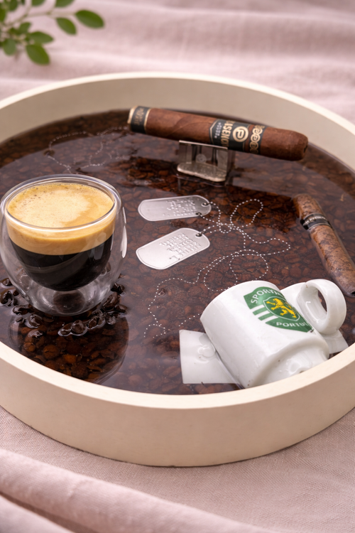 Close up of bespoke resin tray showing coffee beans preserved in deep-pour dark resin, handmade by Held Forever Studio