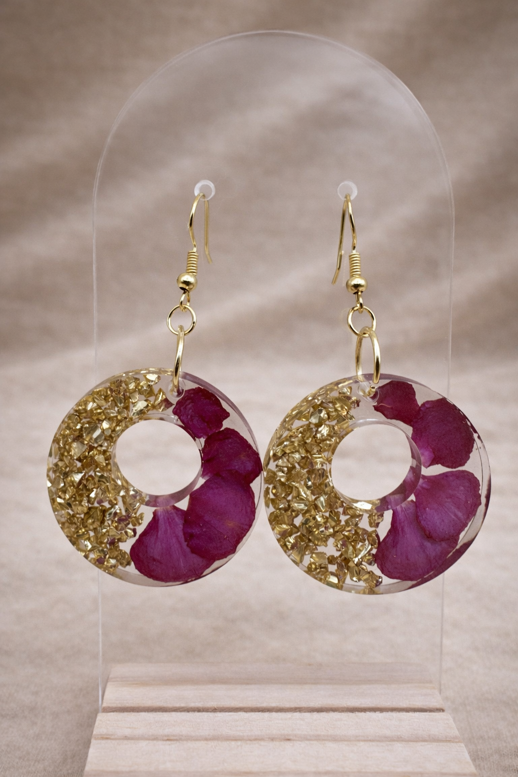 Rose petal and gold foil resin hoop earrings on jewellery bust display — handmade by Held Forever Studio, Lancashire UK