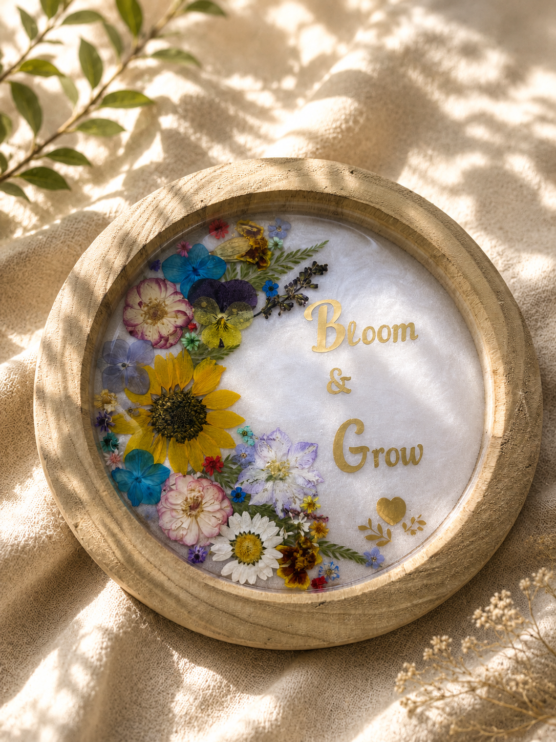 Top view of Bloom and Grow pressed flower resin tray in wood frame, handmade by Held Forever Studio