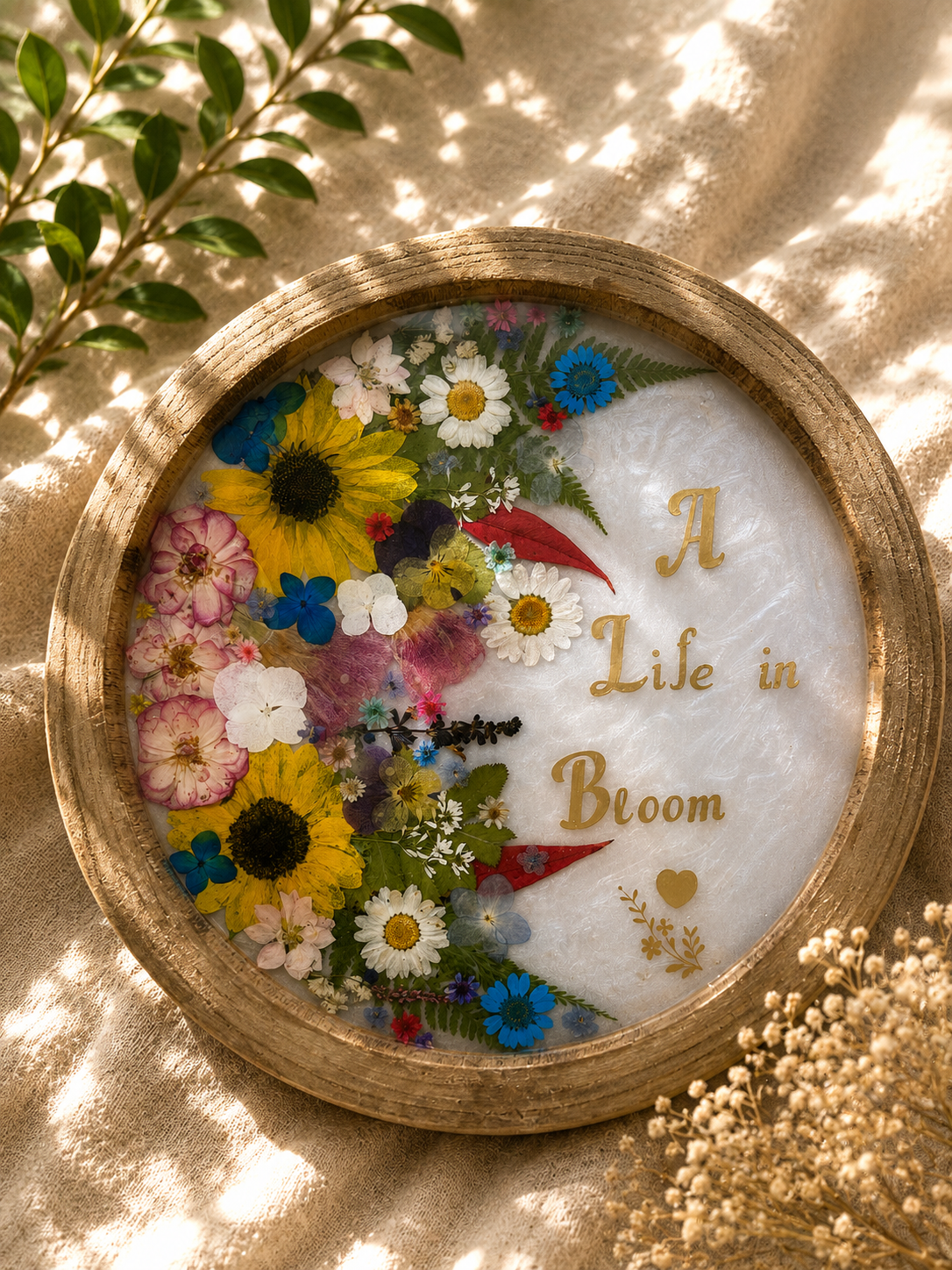Top view of A Life in Bloom pressed flower resin tray in wood frame, handmade in Lancashire UK