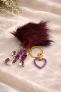Personalised resin initial letter keyring with real dried flower petals, gold leaf flakes and heart charm by Held Forever Studio