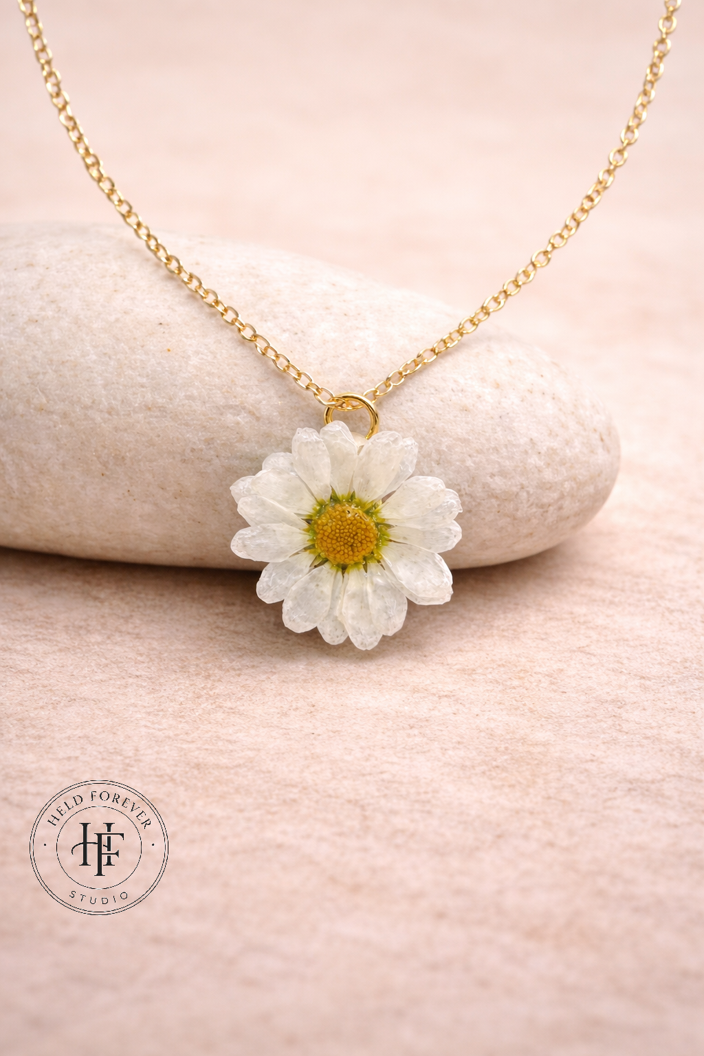 Real daisy resin jewellery set — pendant necklace and matching stud earrings on display card, handmade in Lancashire UK