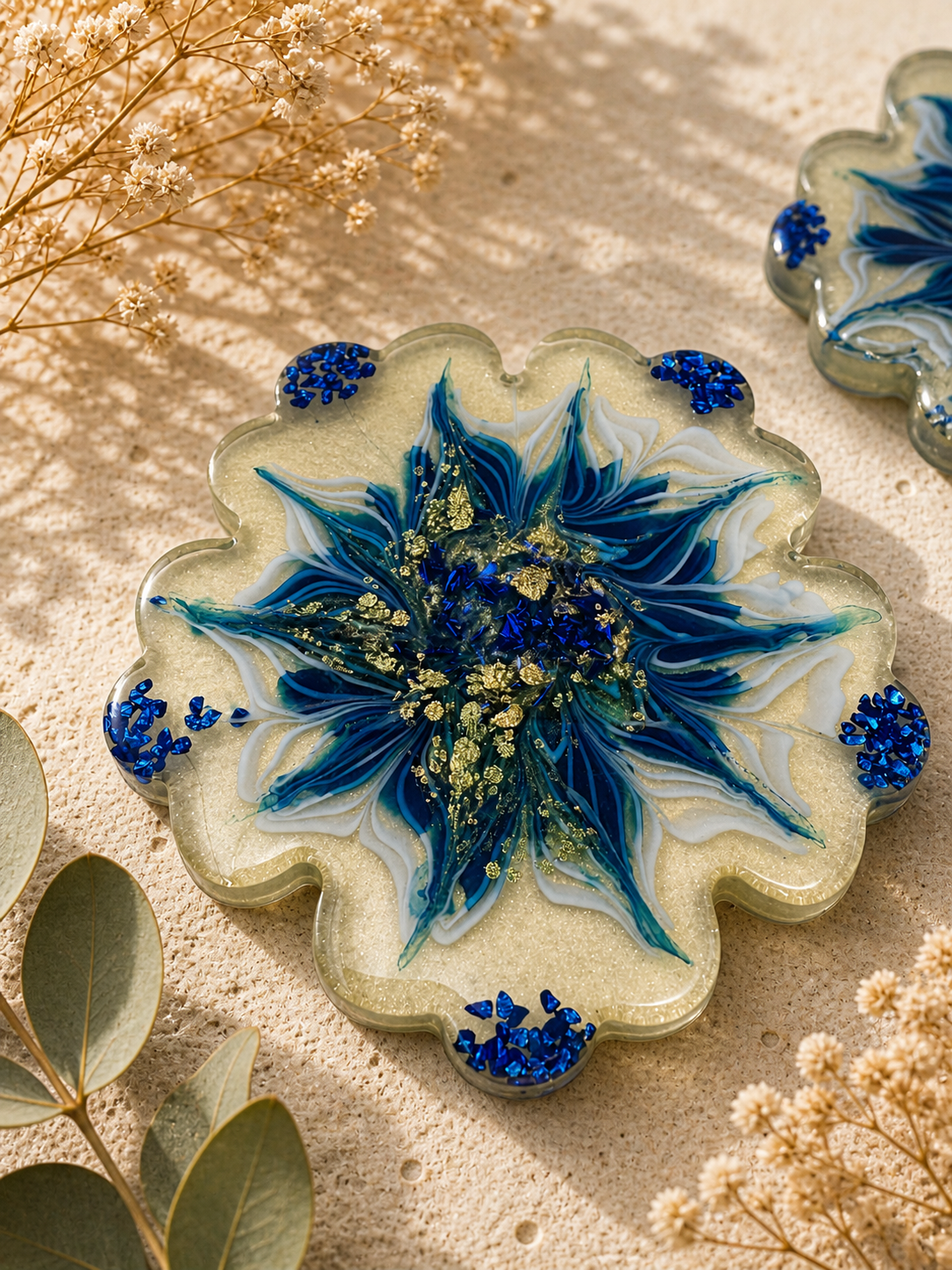 Cobalt blue resin kitchen set flat lay — flower bowl and 4 matching scallop coasters with pearl iridescent shimmer | Held Forever Studio