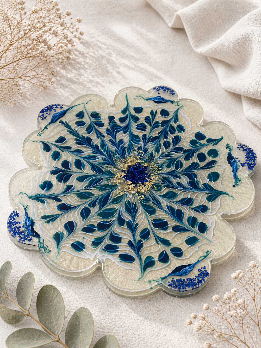 Close-up of blue crystal clusters and gold leaf detail on cobalt blue resin coaster — handmade resin gift UK