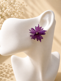 Real preserved flower resin stud earrings handmade by Held Forever Studio – purple bloom sealed in UV resin with gold stud post