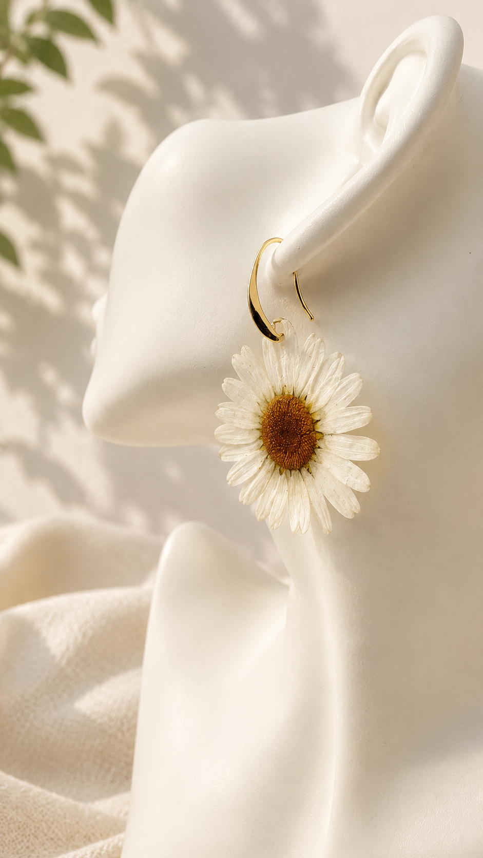 Handmade pressed daisy resin drop earrings by Held Forever Studio, Lancashire UK