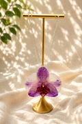 Purple orchid resin pendant necklace with real preserved orchid bloom on 925 sterling silver chain, handmade by Held Forever Studio in Lancashire UK