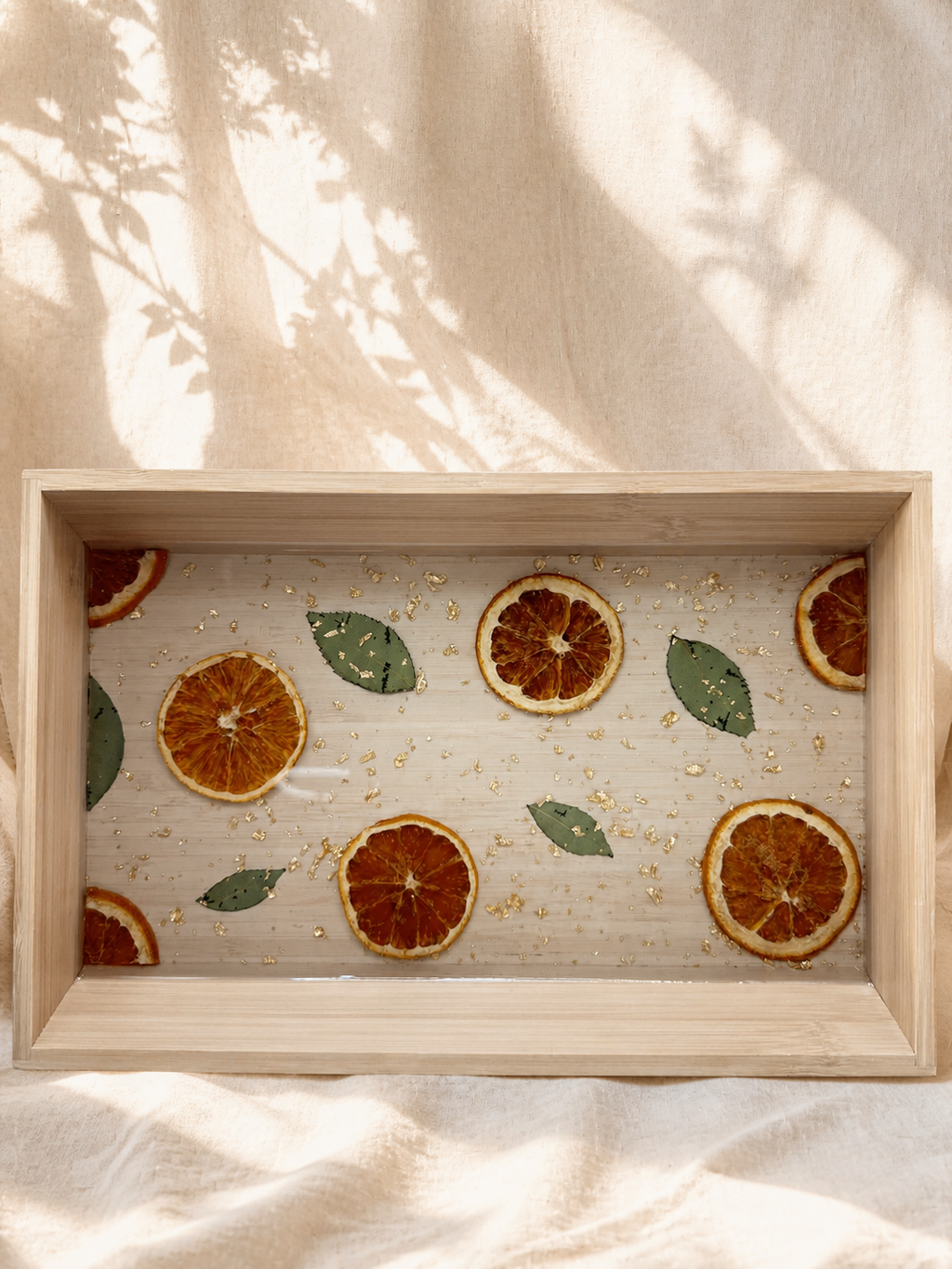 Top view of the bamboo-framed citrus resin tray, handmade in Lancashire UK