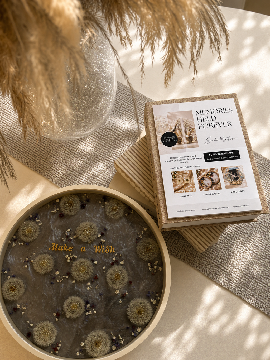 Detail shot of the "Make a Wish" dandelion resin tray styled with dried pampas grass, handmade by Held Forever Studio